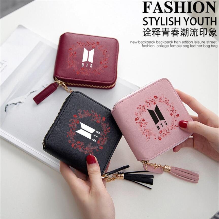 Logo printed tassel wallet female zipper clutch bag