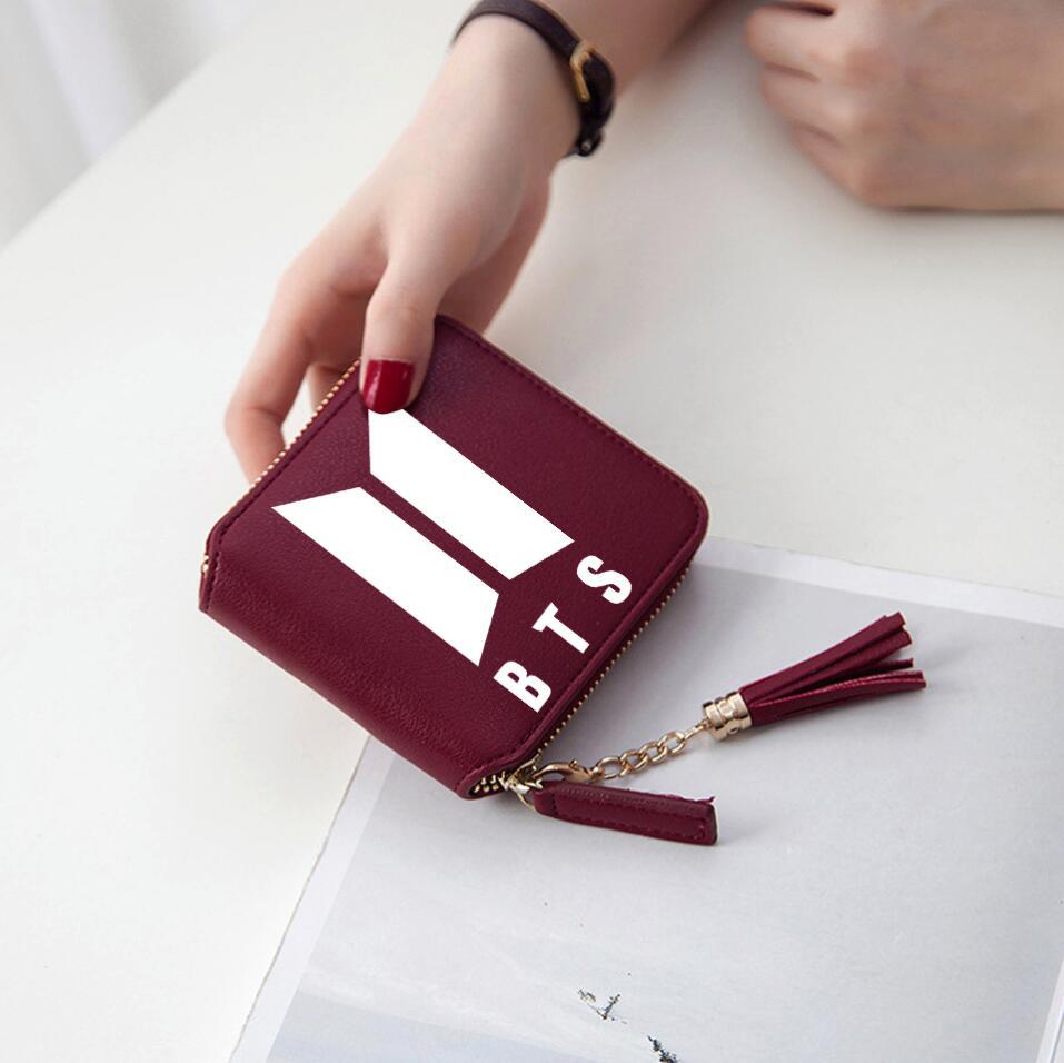 Logo printed tassel wallet female zipper clutch bag