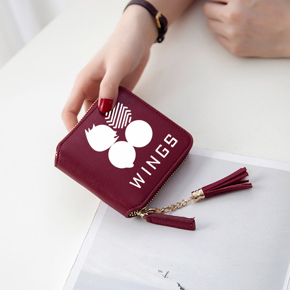 Logo printed tassel wallet female zipper clutch bag