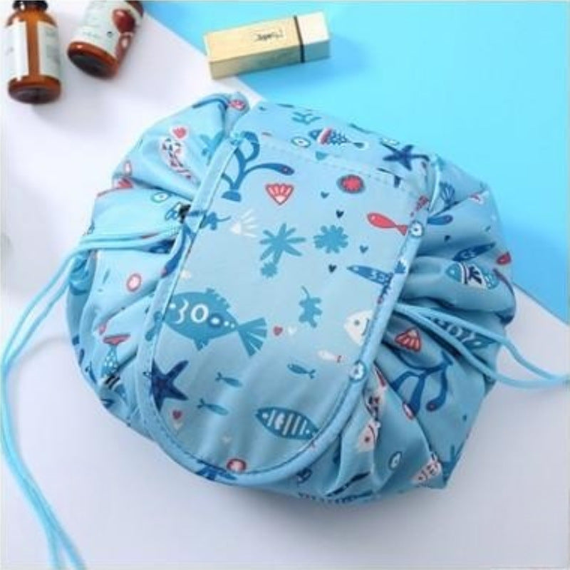 Folding induction lazy makeup bag drawstring waterproof cartoon cute storage bag autumn and winter cosmetic bag wholesale