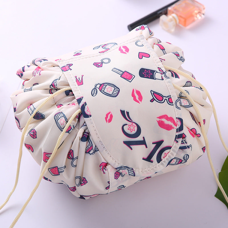 Folding induction lazy makeup bag drawstring waterproof cartoon cute storage bag autumn and winter cosmetic bag wholesale