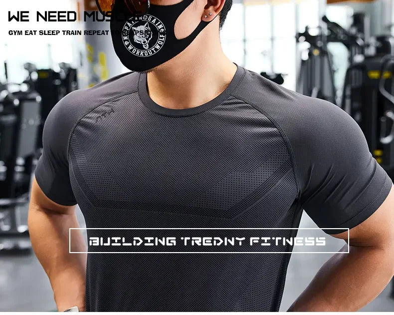 Men Dry Fit Sport Short Sleeve T-shirt Running Compression Sweatshirt Tight Sportswear Gym Fitness Elastic Shirts Top Rash Guard